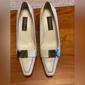 David Aaron pumps in winter white with metal detail. 1.5 inch heels.